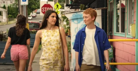 Two people walking on the street